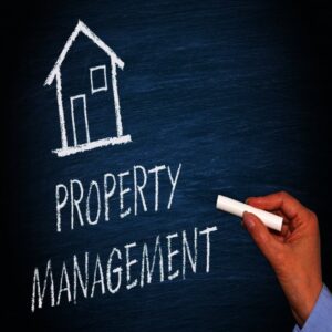 Property Management Written with white Chalkboard